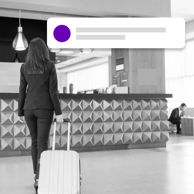 Guest walking into hotel lobby with notification bubble appearing